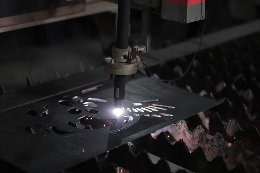 Thermal beam cutting precision parts from a metal sheet